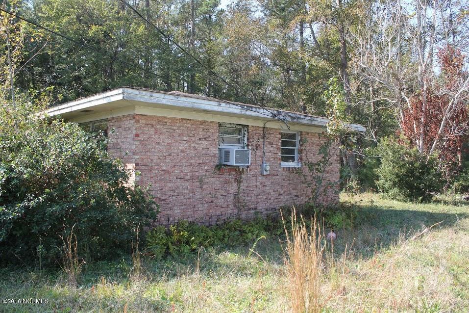 4409 Blue Clay Road Castle Hayne, NC 28429 - Photo 8 of 11 8 side
