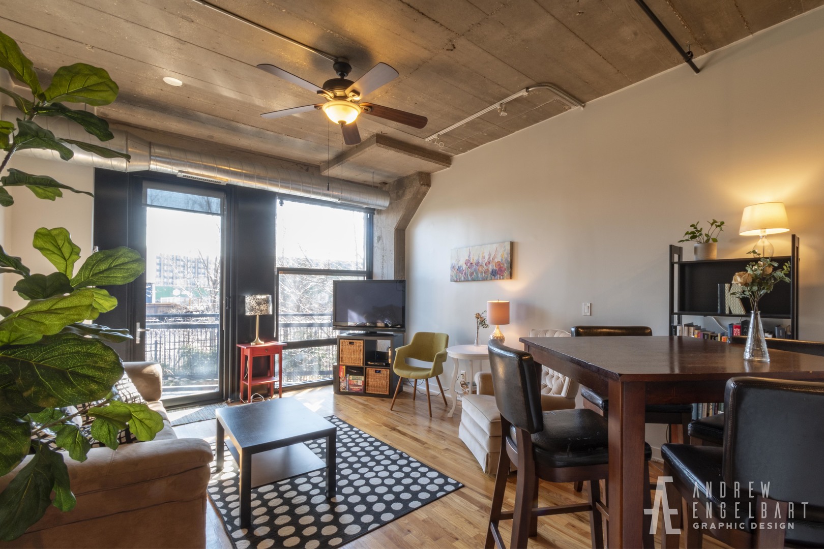 1151 West 15th Street, Unit 209 Chicago, IL 60608 - Photo 2 of 30 a room with furniture a chandelier and a rug