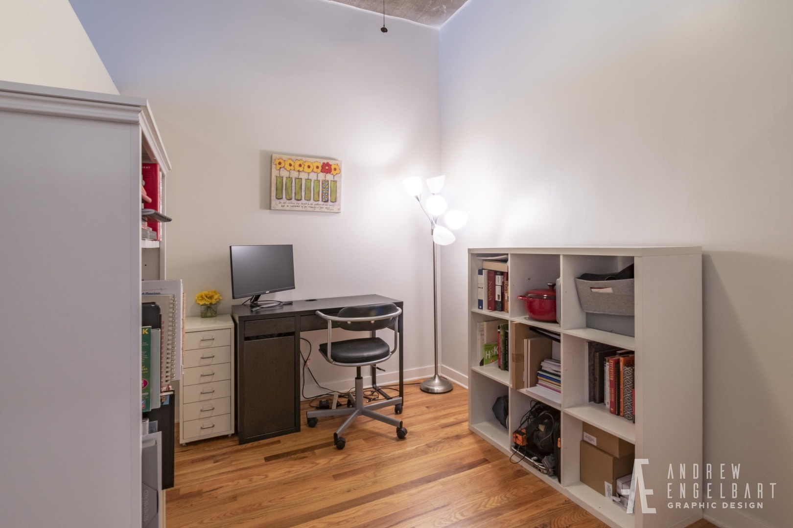 1151 West 15th Street, Unit 209 Chicago, IL 60608 - Photo 11 of 30 a view of a workspace with furniture and wooden floor