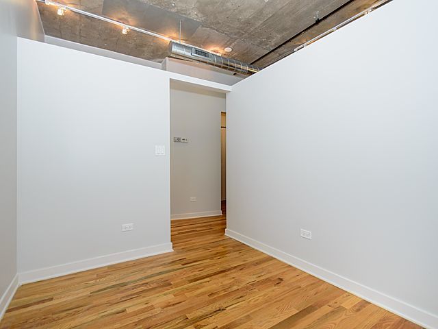 1151 West 15th Street, Unit 209 Chicago, IL 60608 - Photo 13 of 30 a view of an empty room