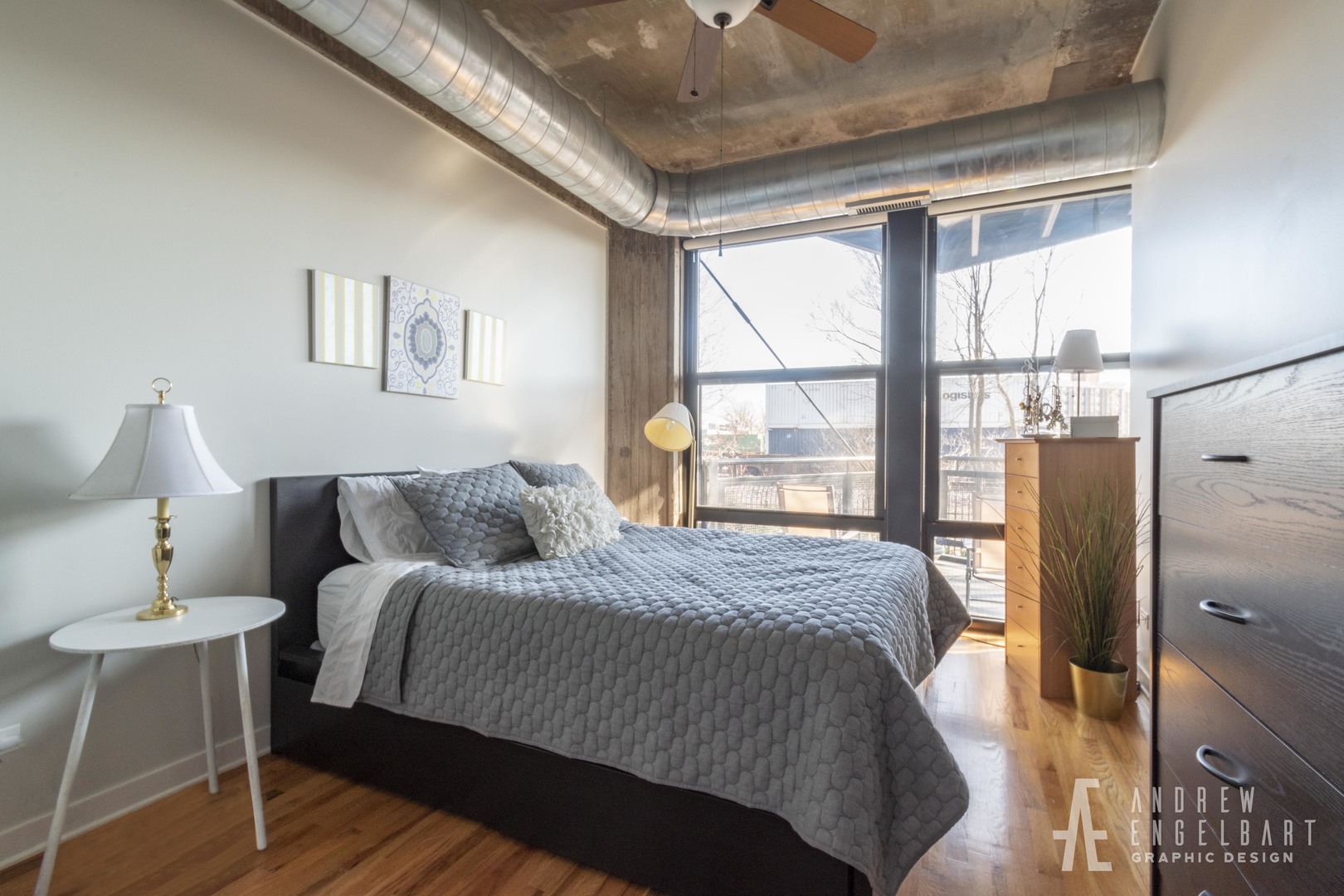 1151 West 15th Street, Unit 209 Chicago, IL 60608 - Photo 16 of 30 a bedroom with a large bed and a window