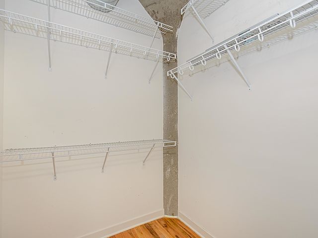 1151 West 15th Street, Unit 209 Chicago, IL 60608 - Photo 18 of 30 a view of a room with racks on the wall