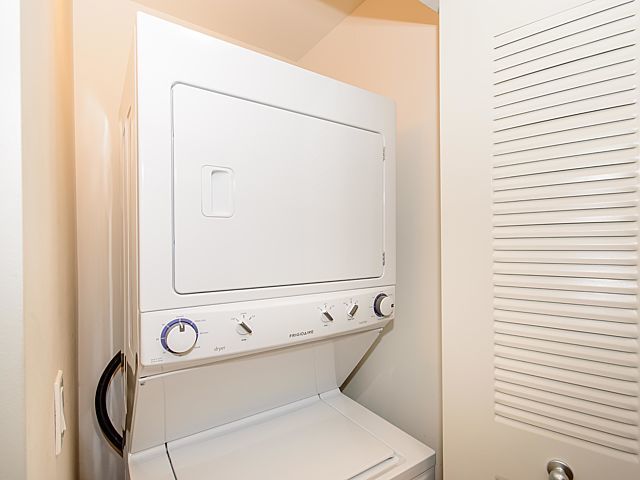 1151 West 15th Street, Unit 209 Chicago, IL 60608 - Photo 19 of 30 a close up of a washer and dryer
