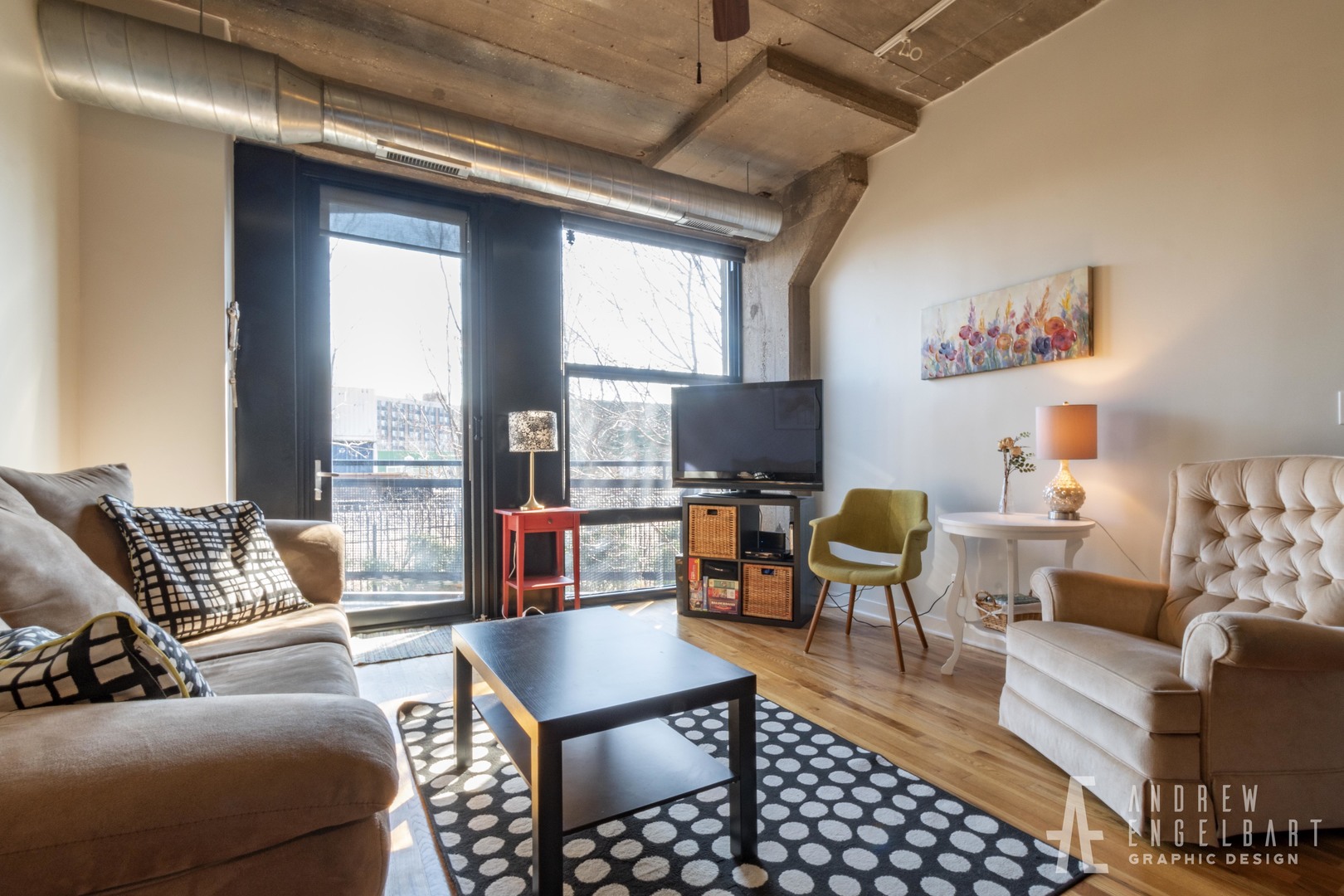 1151 West 15th Street, Unit 209 Chicago, IL 60608 - Photo 3 of 30 a living room with furniture and a flat screen tv