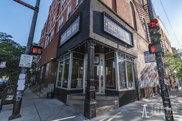 1151 West 15th Street, Unit 209 Chicago, IL 60608 - Photo 27 of 30 a view of a building with sitting area