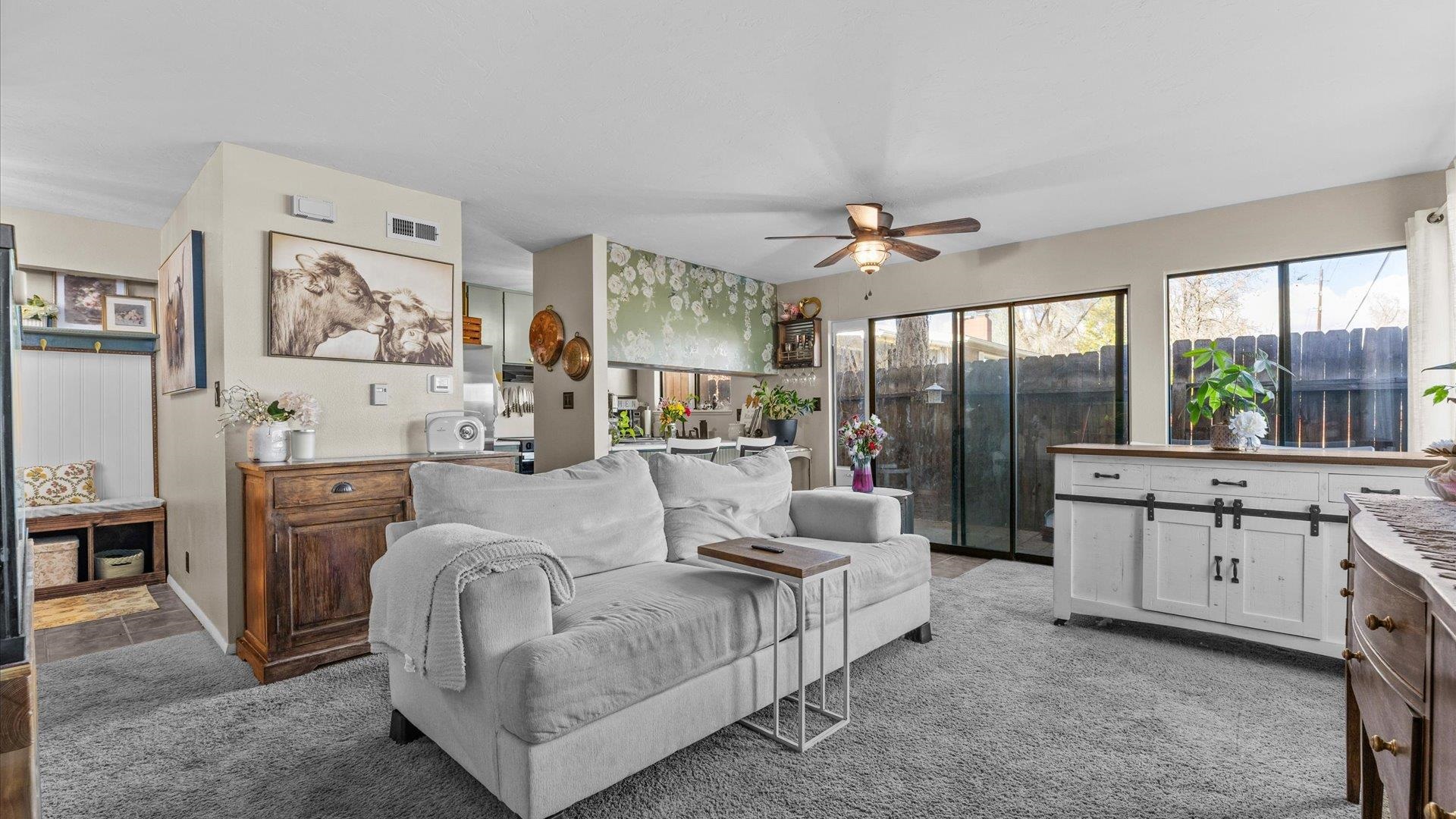 517-28 28 1/2 Road, Unit 4E Grand Junction, CO 81501 - Photo 5 of 15 a living room with furniture and a large window