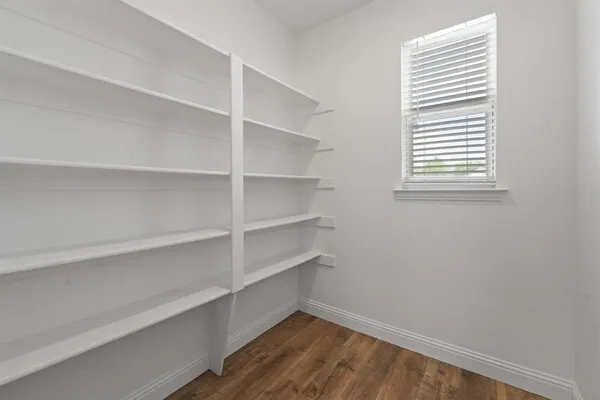 a view of a room with rack on the wall
