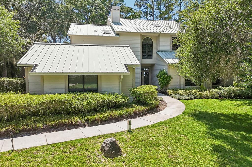 17810 Crawley Road Odessa, FL 33556 - Photo 71 of 76 a front view of a house with a yard