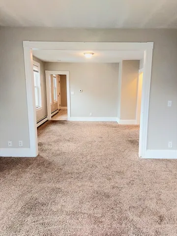 an empty room with a natural light