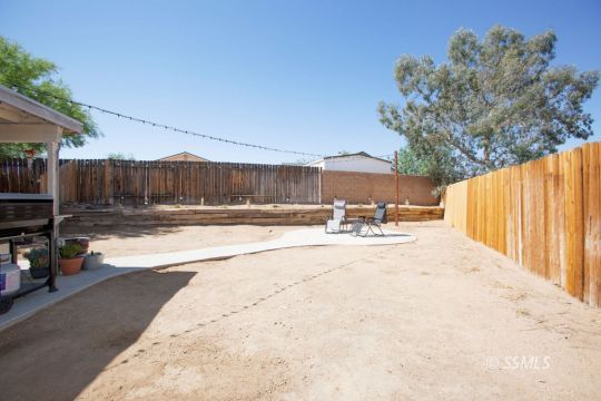 421 Christopher Court Ridgecrest, CA 93555 - Photo 42 of 50 a view of a backyard of the house