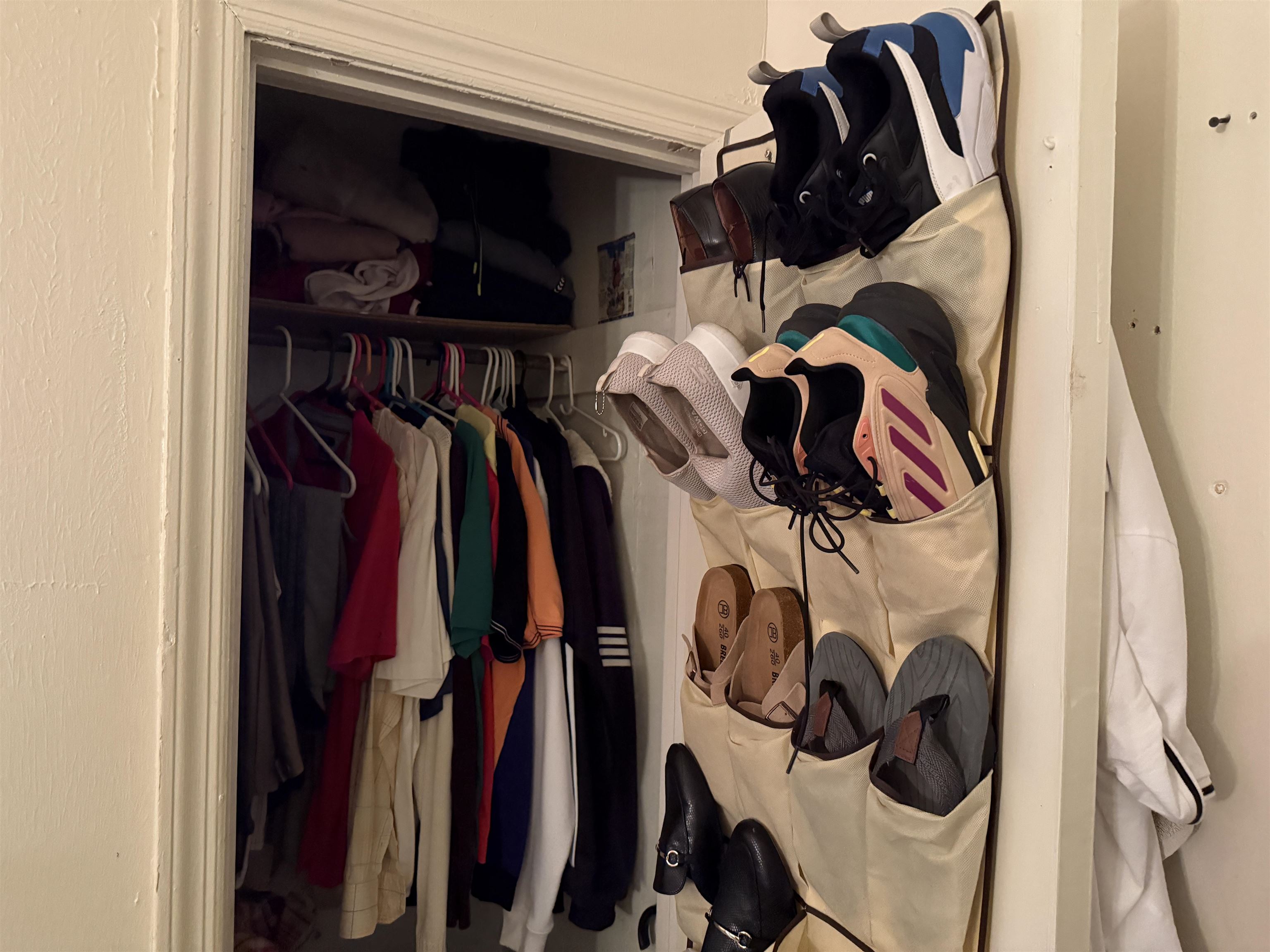 1309 Summit Avenue Union City, NJ 07087 - Photo 23 of 31 a view of walk in closet with clothes and shoes