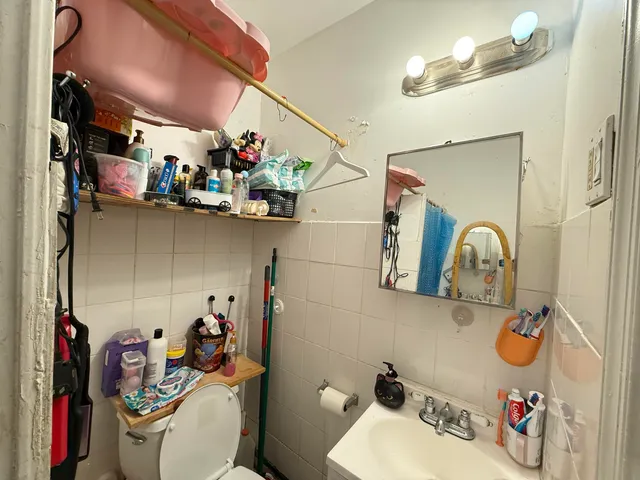 a living room filled with furniture and a chandelier