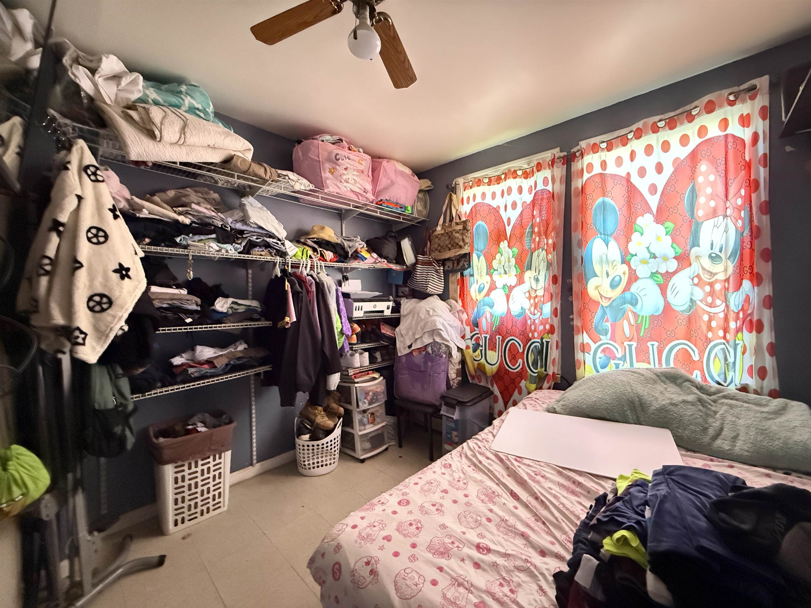 1309 Summit Avenue Union City, NJ 07087 - Photo 30 of 31 a bed room with a bed and a tv