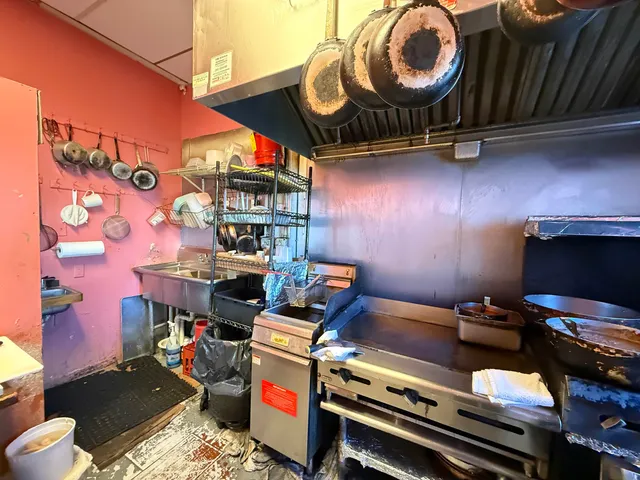 a room with furniture and a fireplace