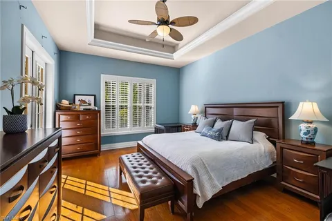 a spacious bathroom with a sink double vanity and a mirror