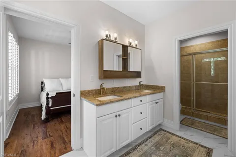 a bathroom with a shower and toilet