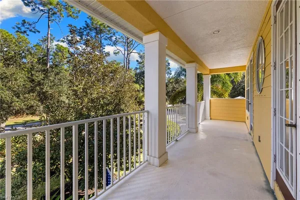 a view of a living room and floor to ceiling window or chandelier
