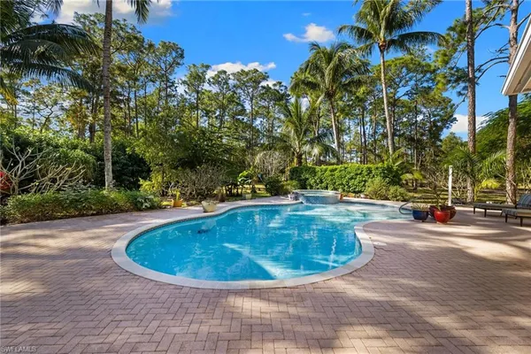 a view of a house with swimming pool