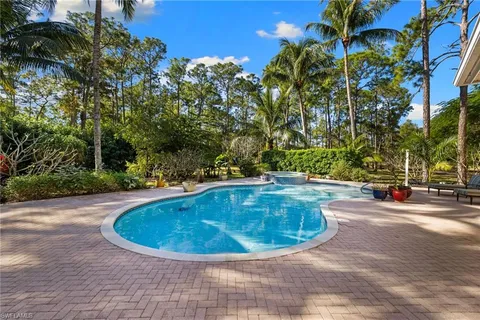 a view of a house with swimming pool