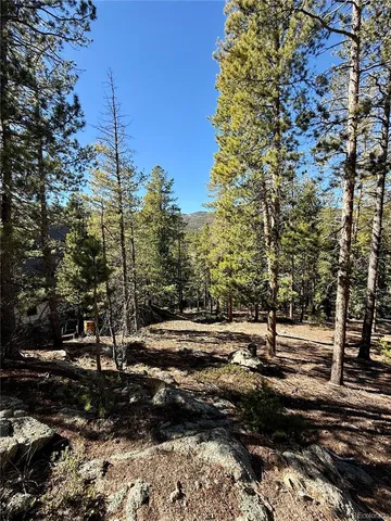 a view of a street with a building