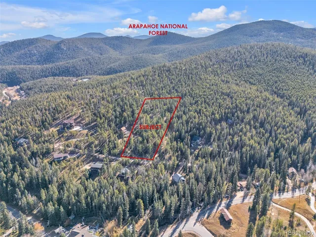 a view of a back yard of the house