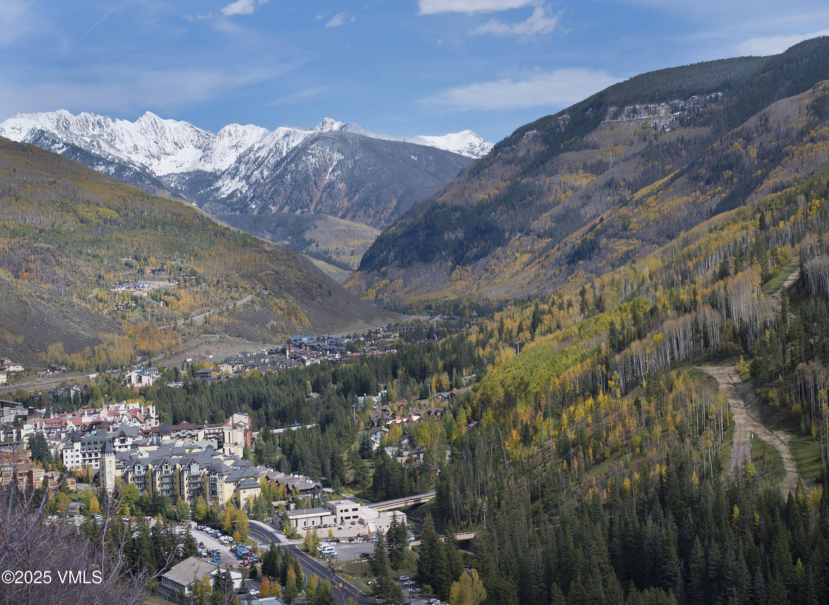 2448 Garmisch Drive, Unit 4 Vail, CO 81657 - Photo 14 of 19 a view of a city with mountains in the background