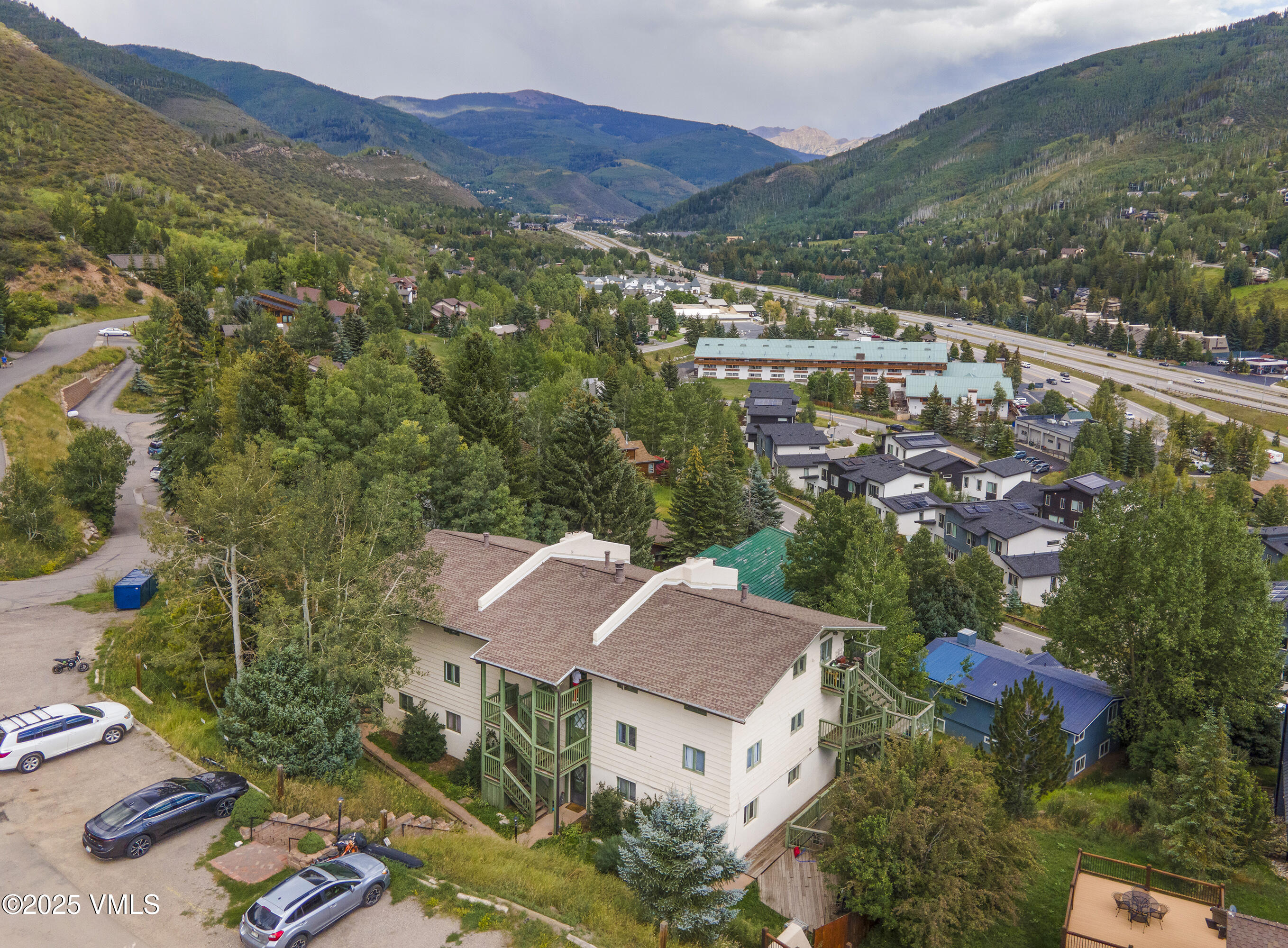 2448 Garmisch Drive, Unit 4 Vail, CO 81657 - Photo 18 of 19 an aerial view of residential houses with outdoor space