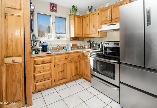 a bathroom with a sink toilet and vanity