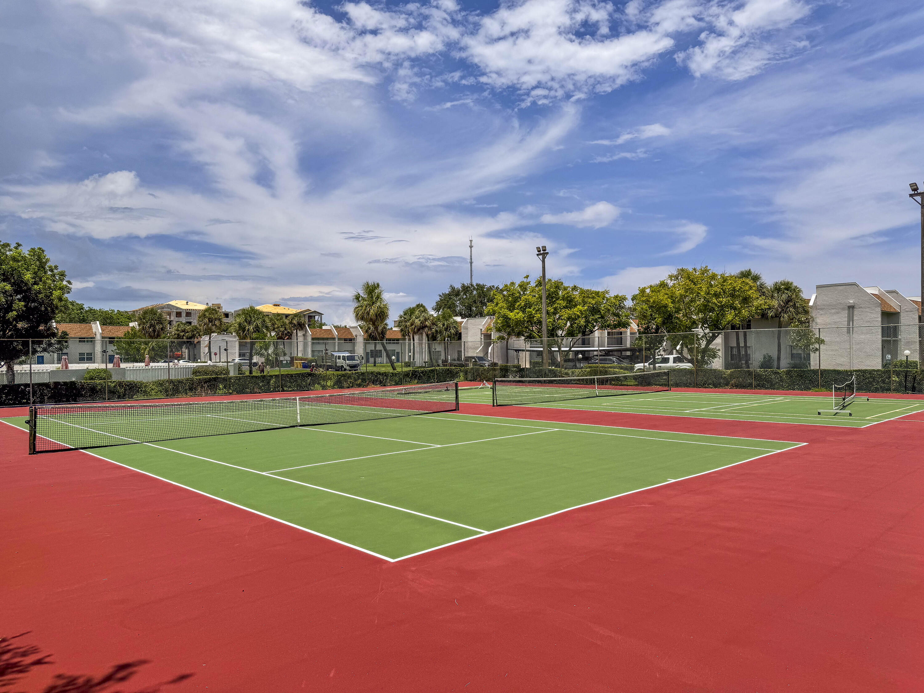 2945 Southwest 22nd Avenue, Unit 206 Delray Beach, FL 33445 - Photo 19 of 20 Tennis Court