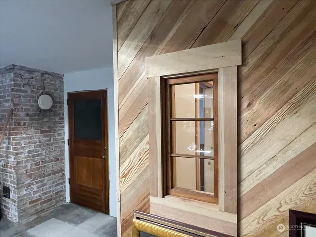 a bathroom with a toilet a sink and shower
