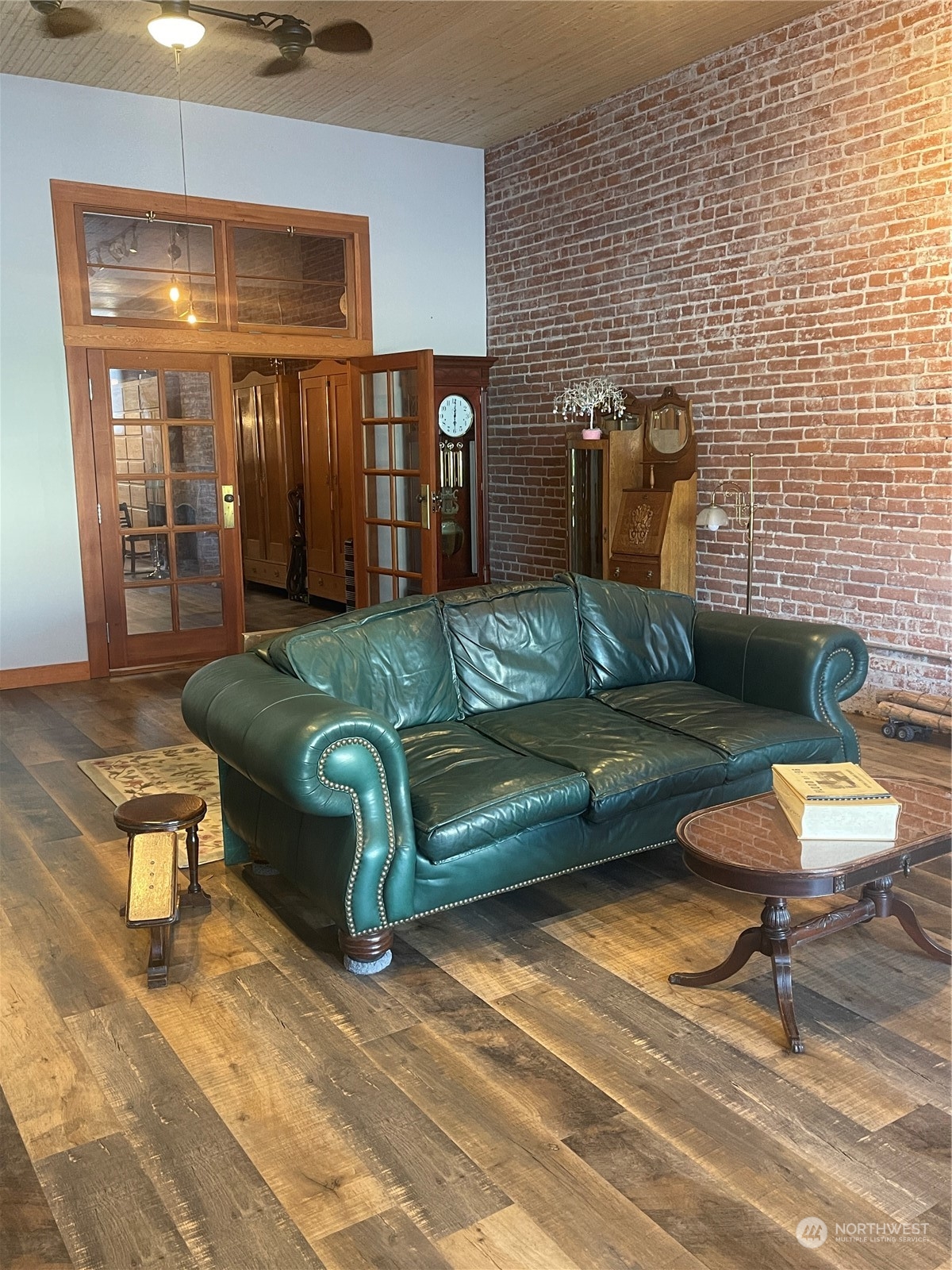 358 East Main Street Dayton, WA 99328 - Photo 3 of 37 a living room with furniture and wooden floor