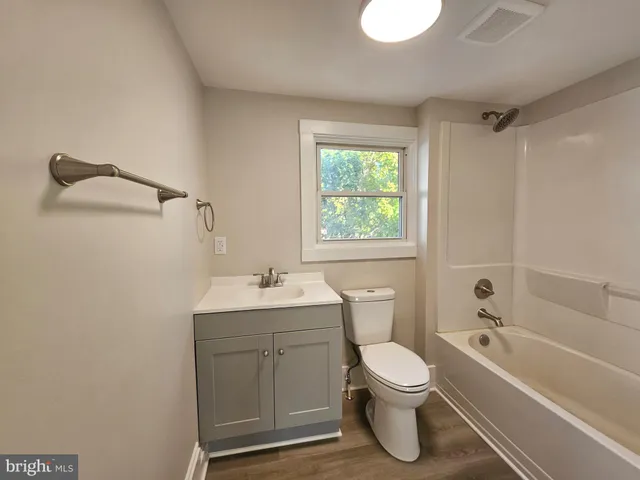 a view of a large body of water with water fall