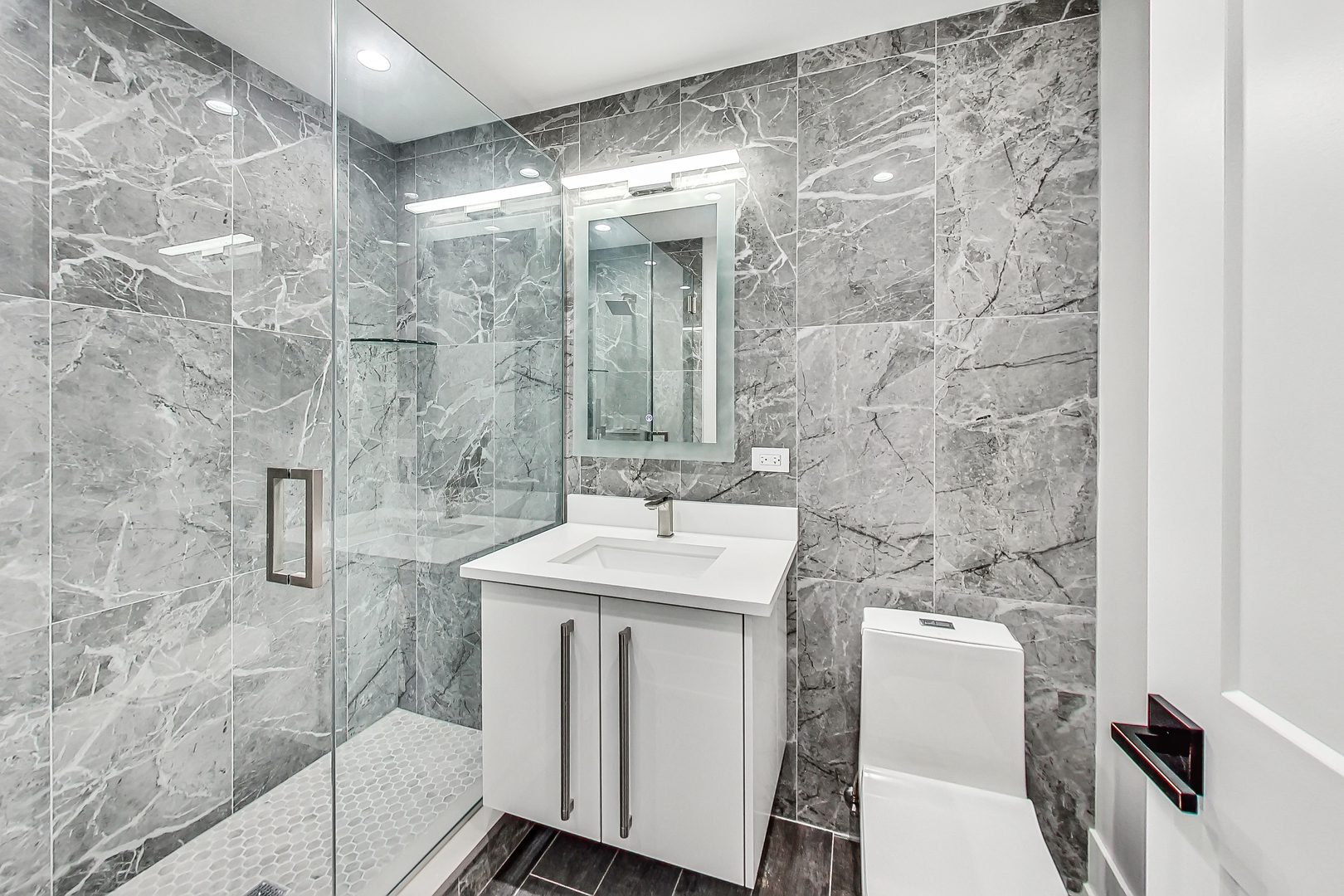 1331 Pfingsten Road Northbrook, IL 60062 - Photo 32 of 38 a bathroom with a sink and mirror