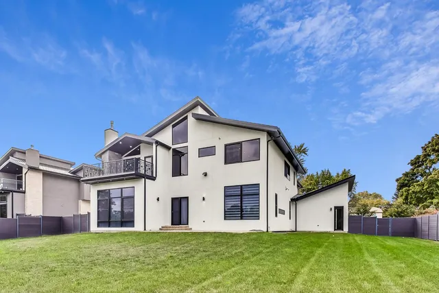 a view of yard with swimming pool and outdoor seating