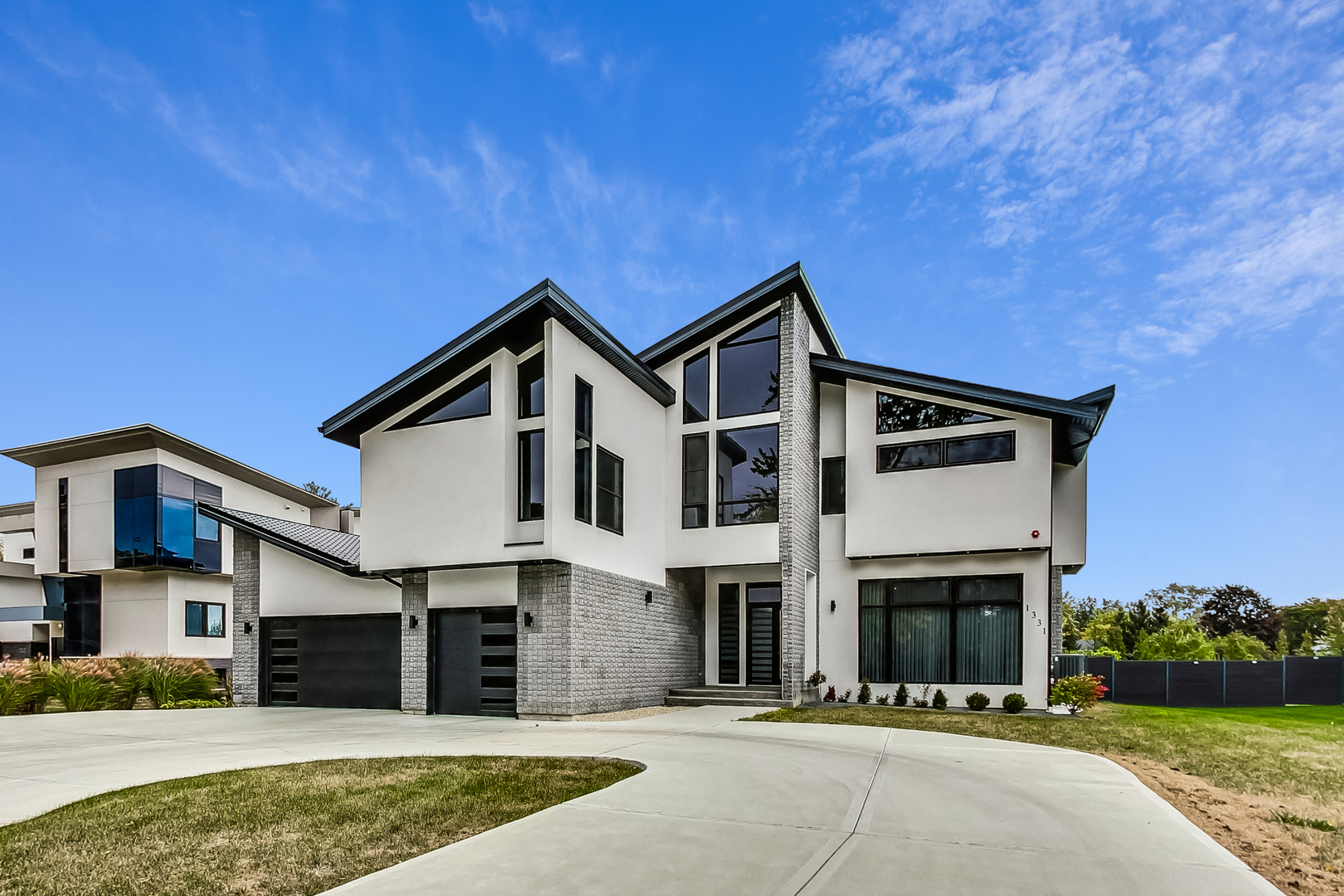 1331 Pfingsten Road Northbrook, IL 60062 - Photo 6 of 38 a front view of a house with a yard