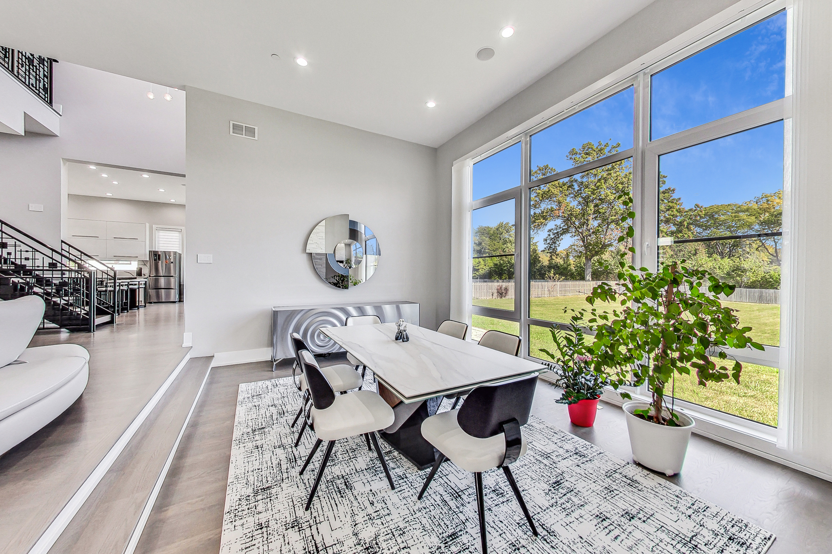 1331 Pfingsten Road Northbrook, IL 60062 - Photo 10 of 38 a view of a dining room with furniture window and wooden floor