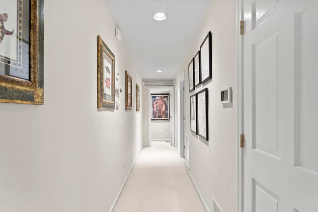 a bedroom with bed and window