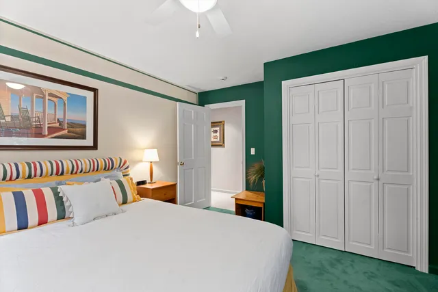 a bedroom with bed and window