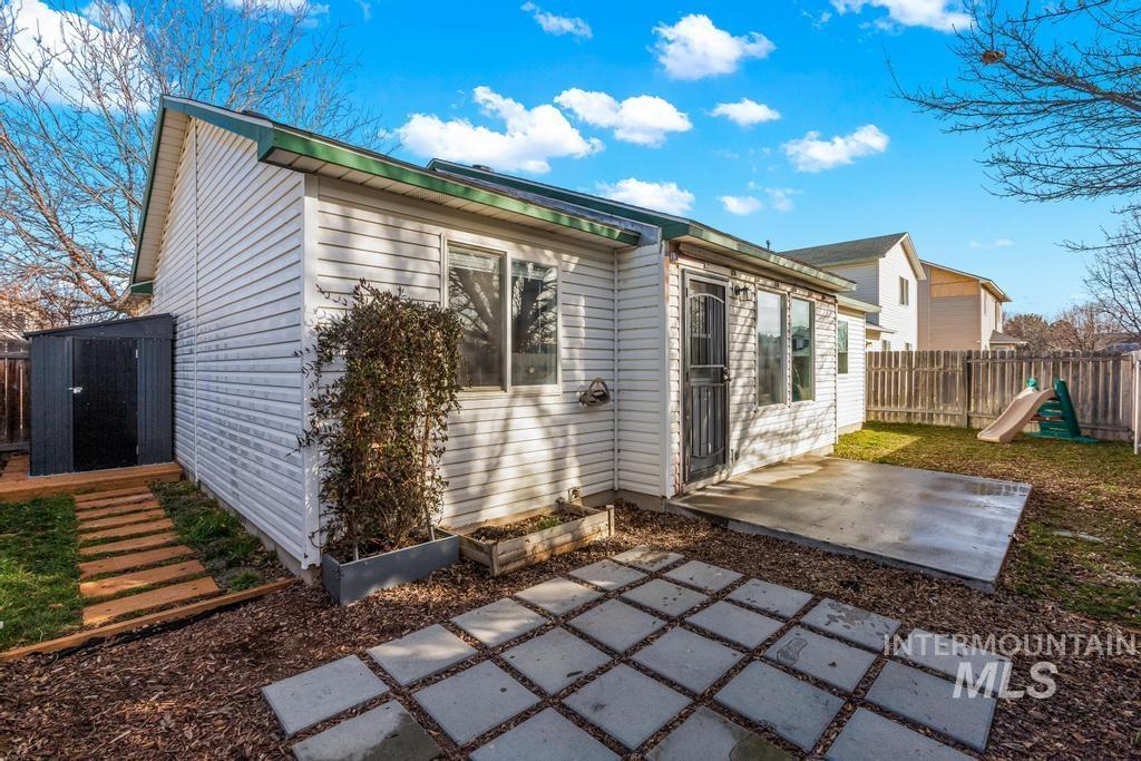 1206 Flint Drive Caldwell, ID 83607 - Photo 15 of 20 Back of property with a patio