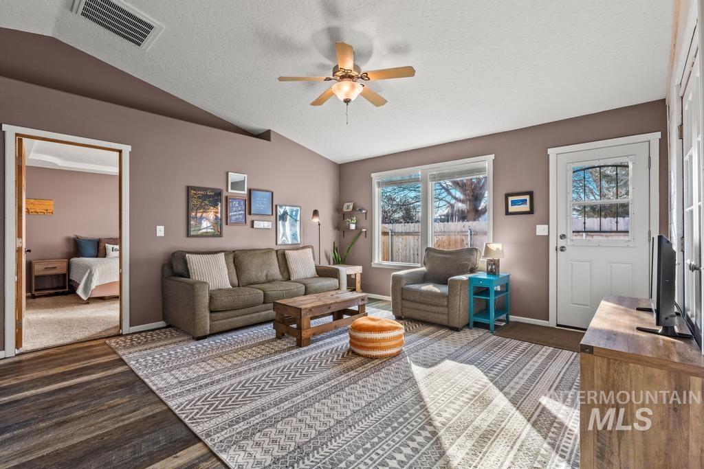 1206 Flint Drive Caldwell, ID 83607 - Photo 4 of 20 Living area with a ceiling fan and wood finished floors