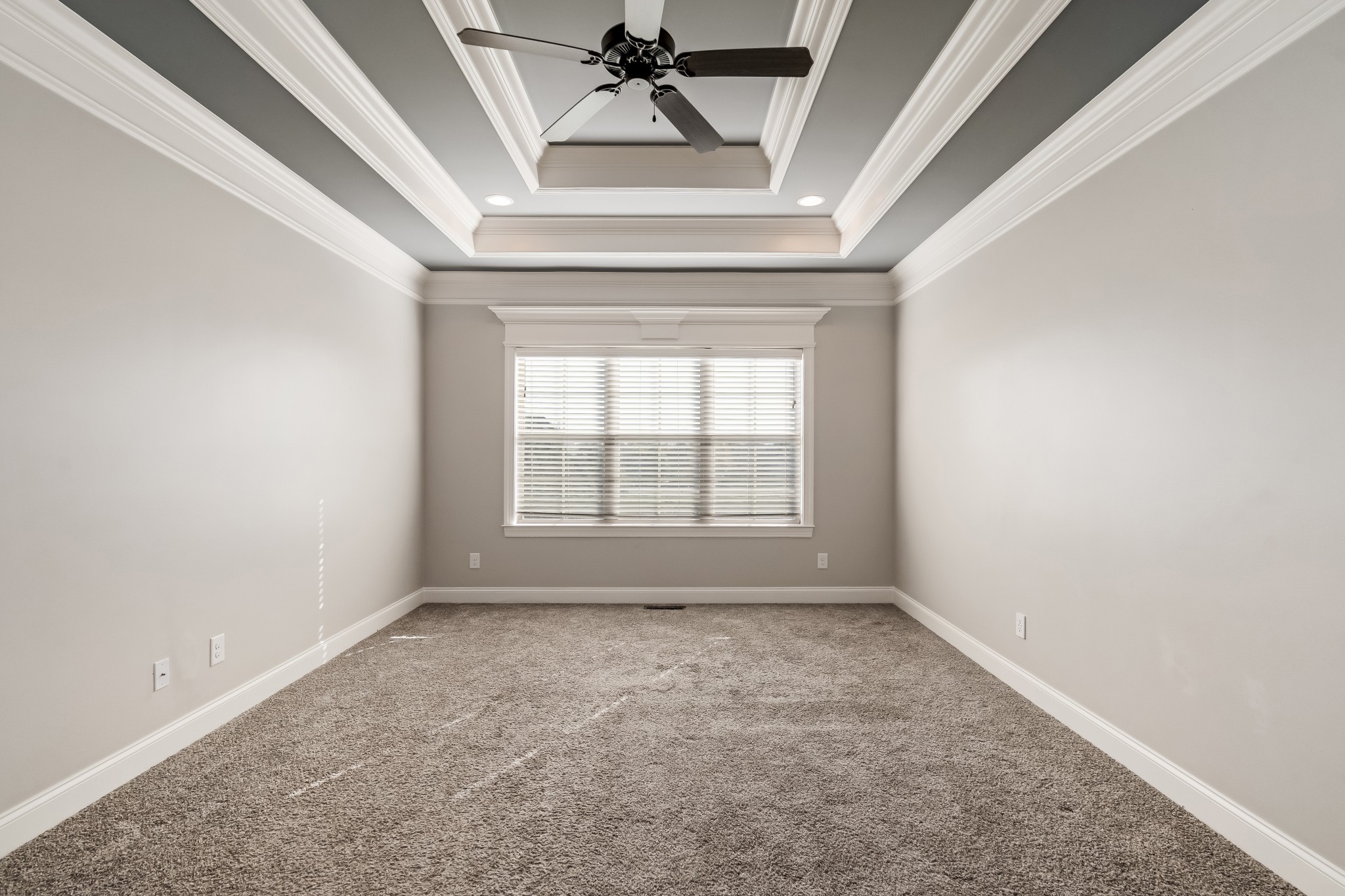 3008 Sakari Circle Spring Hill, TN 37174 - Photo 17 of 44 an empty room with a chandelier fan and windows