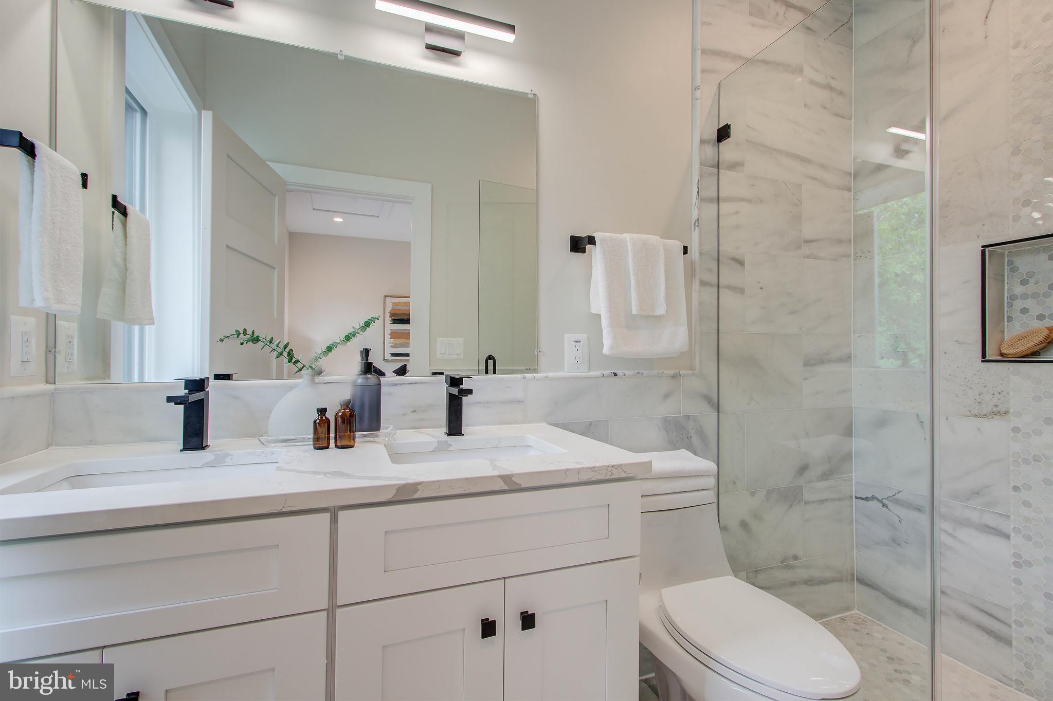 909 L Street Northeast Washington, DC 20002 - Photo 15 of 30 Master Bathroom with Marble Tiles