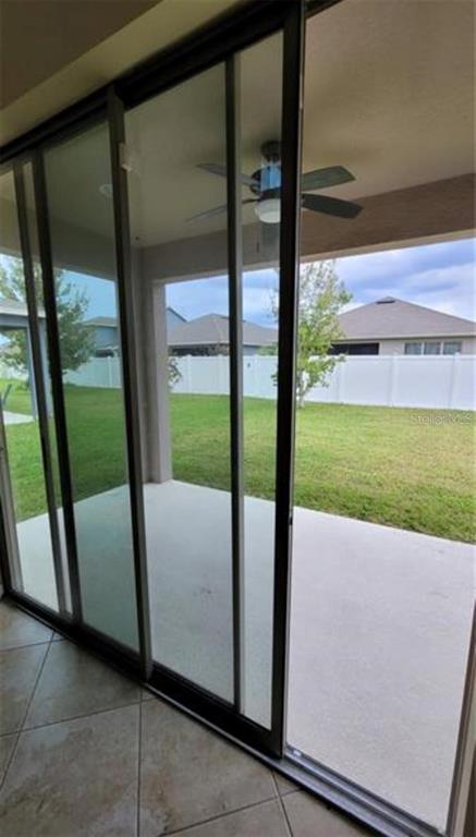 4025 Scarlet Branch Road Orlando, FL 32824 - Photo 12 of 13 a view of backyard with large window