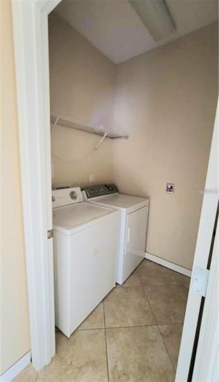 4025 Scarlet Branch Road Orlando, FL 32824 - Photo 13 of 13 a utility room with washer and dryer