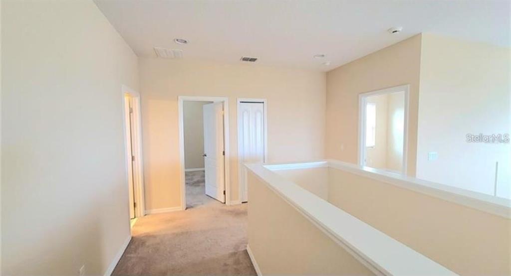 4025 Scarlet Branch Road Orlando, FL 32824 - Photo 9 of 13 a spacious bathroom with a tub and shower