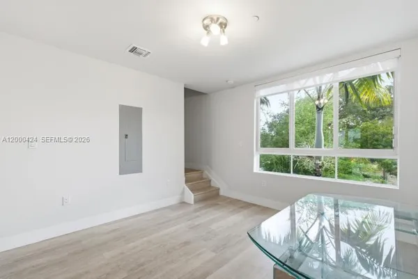 a view of a livingroom with furniture window and outside view