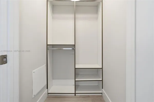 a view of an empty walk in closet