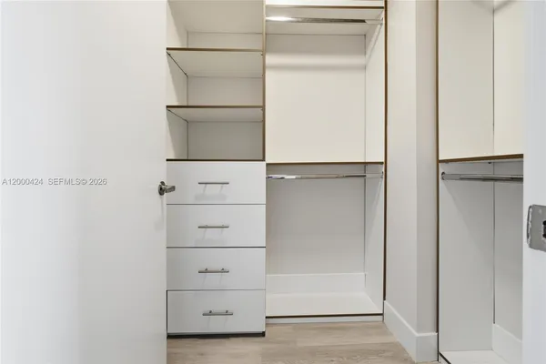 a bathroom with a sink a toilet and a bathtub