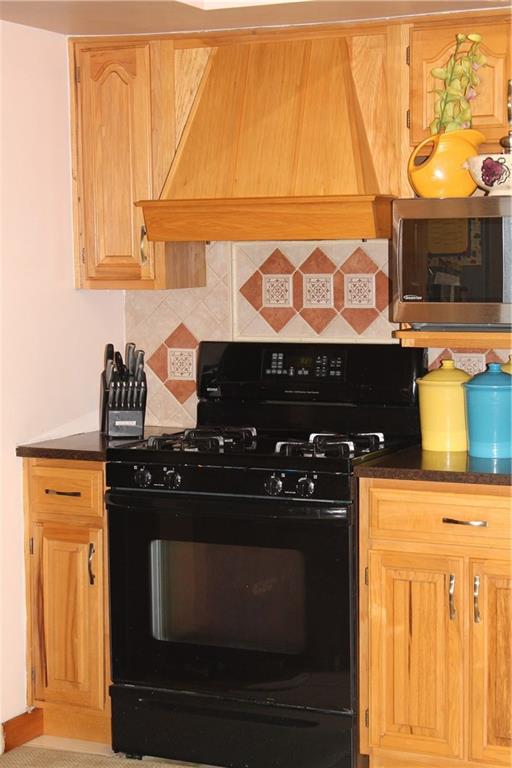 125 Meadowbrook Road Renfrew, PA 16053 - Photo 4 of 18 Look at tile work on kitchen back splash