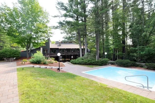 a view of a back yard of the house